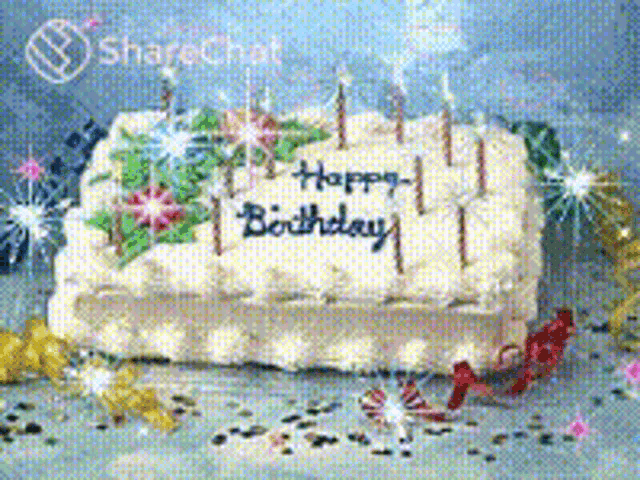 a birthday cake with candles and the words happy birthday written on it