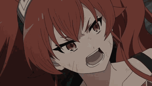 a close up of a girl 's face with red hair and black eyes