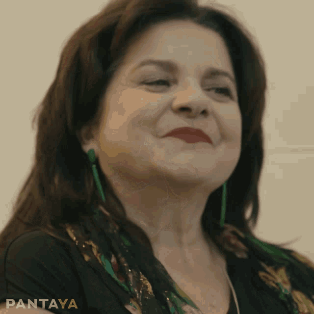 a close up of a woman 's face with the word pantaya in the corner