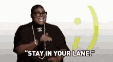 a man wearing glasses and a chanel necklace says " stay in your lane " .