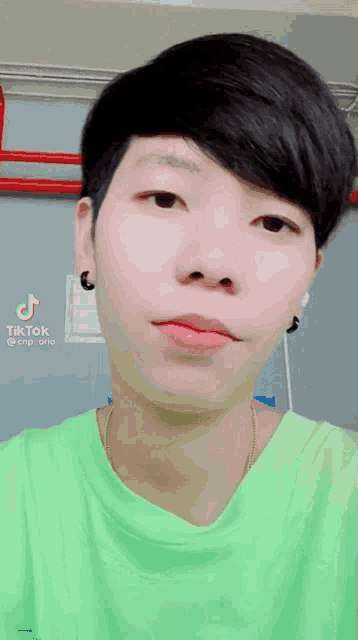 a close up of a person 's face with a tik tok watermark