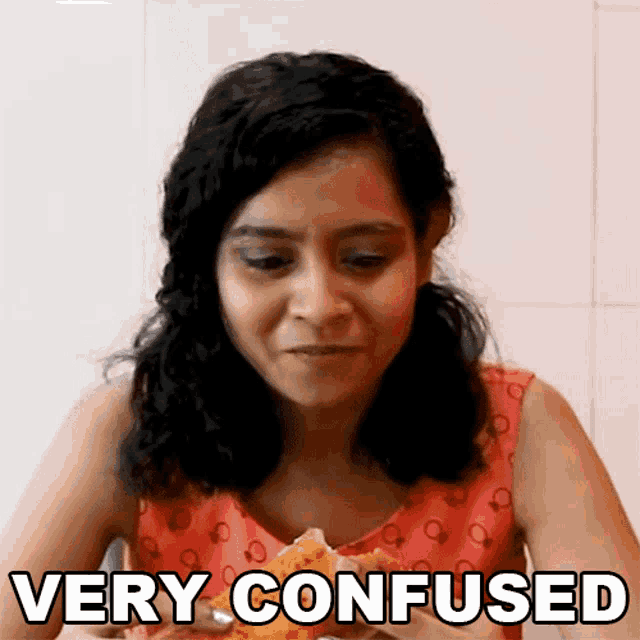 a woman eating a pizza with the words " very confused " next to her