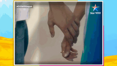 a picture of a couple holding hands with a star india logo in the corner
