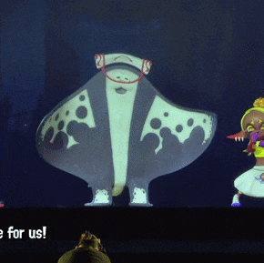 a cartoon character is being projected on a screen with the words " be for us " below it