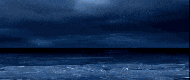 a painting of a large body of water with a cloudy sky