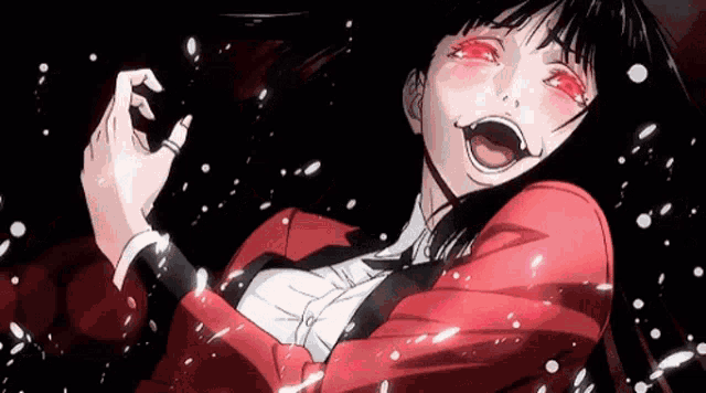 a girl in a red jacket and tie is laughing with her mouth wide open .