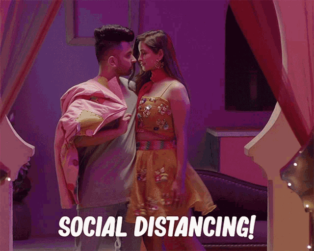 a man and a woman are standing next to each other with social distancing written in the corner