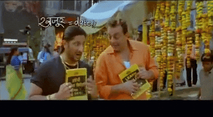 a couple of men standing next to each other with a sign that says " date "
