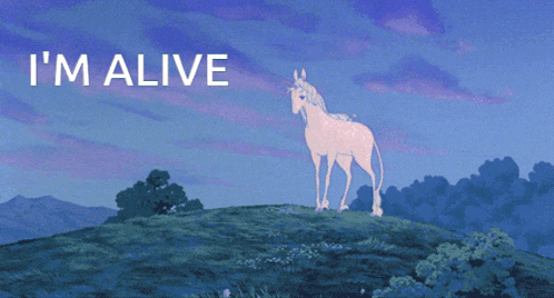 a unicorn standing on top of a hill with the words " i 'm alive " below it