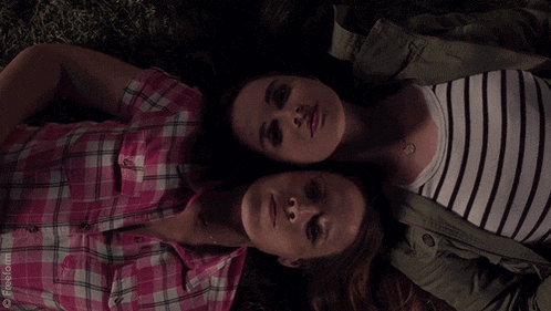 two women laying on their backs with firefox written on the bottom left