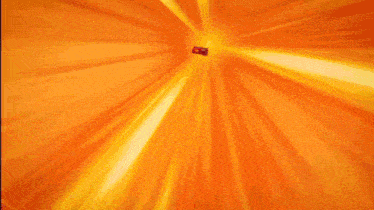 a red cube with the word hot wheels on it is flying in the air