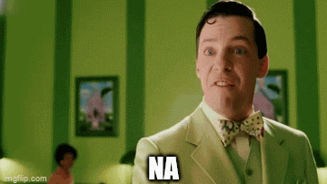a man in a suit and bow tie is making a funny face and says na .