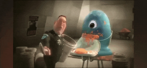 a police officer is standing next to a monster that is eating a chicken .