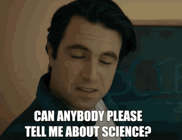 a man says " can anybody please tell me about science " in front of a chalkboard