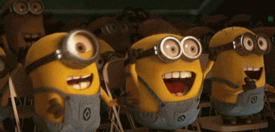 a group of minions wearing goggles and overalls are sitting in chairs