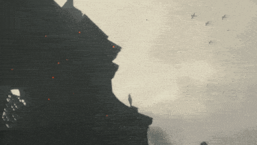 a silhouette of a building with birds flying in the background