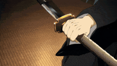 a person holding a sword in their hand with a gold handle