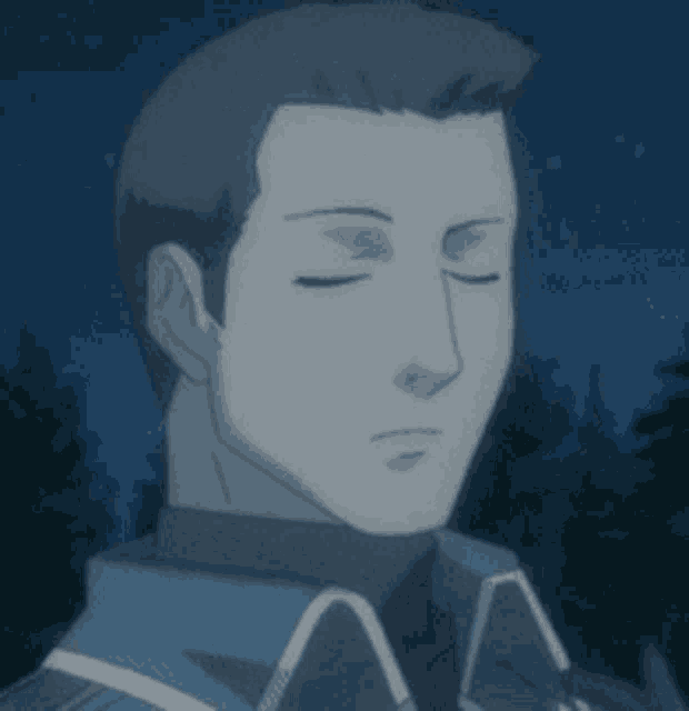 a close up of a man 's face with closed eyes