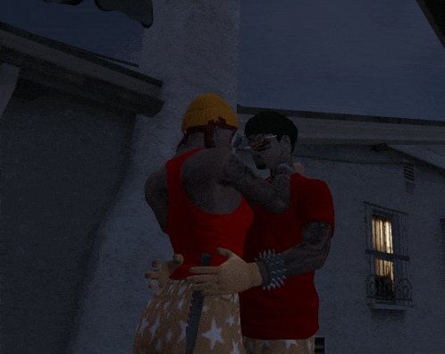 a man with spikes on his wrist is hugging another man in a red shirt