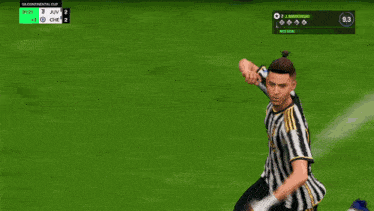 a soccer player is jumping in the air in front of a banner that says ea fc24