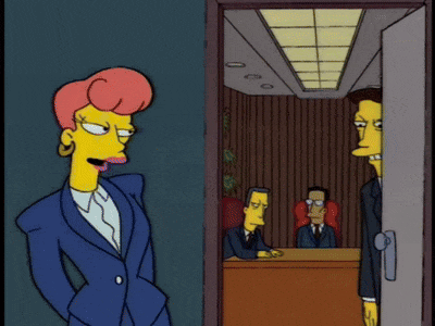 a cartoon of marge simpson and lisa simpson standing next to a door .