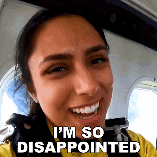 a woman is smiling with the words i 'm so disappointed below her