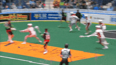 a lacrosse game is being played in front of a banner that says ' end of season '