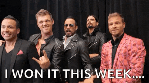 a group of men standing next to each other with the words `` i won it this week '' written on the bottom .