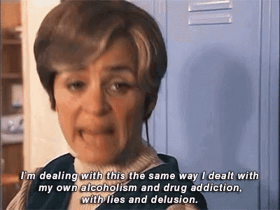 a woman is talking about her alcoholism and drug addiction with lies and delusion .