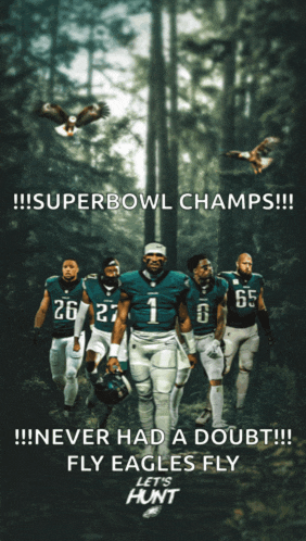 a group of football players are walking through a forest with the caption superbowl champs