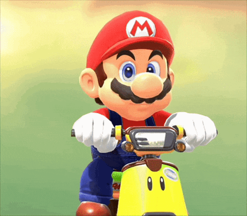 mario is riding a yellow scooter in a video game