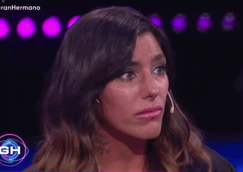 a woman with a microphone in her mouth is on a tv show called gh