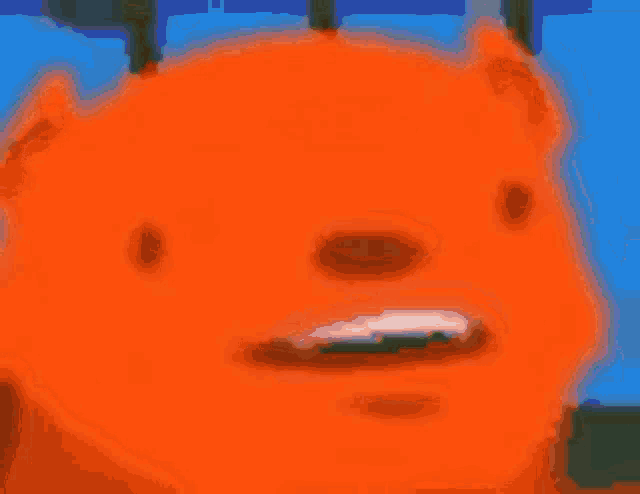 a close up of a cartoon bear 's face with a surprised look on its face .