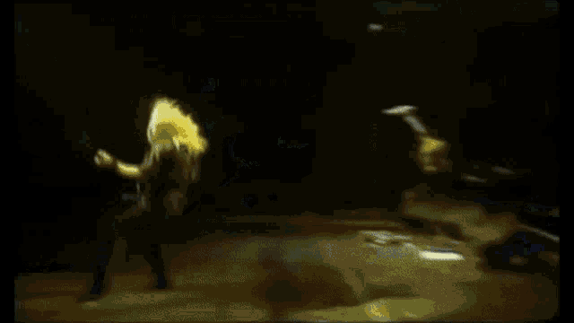 a blurry picture of a person dancing in the dark