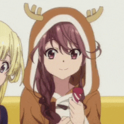 a girl is wearing a deer costume and holding a candy bar .
