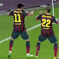 two soccer players with the number 11 and 22 on their shirts are dancing on the field