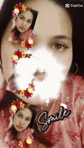 a picture of a woman with flowers around her face and the word smile