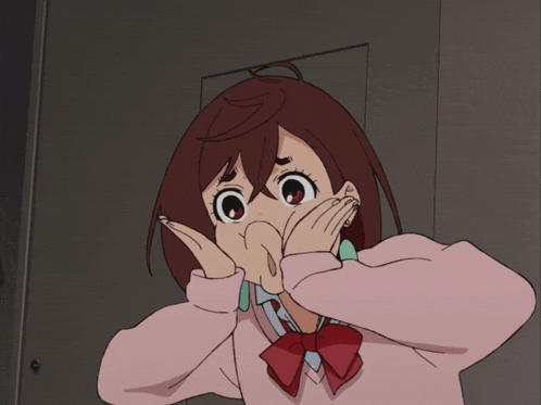 a girl in a pink sweater and red bow tie is making a funny face
