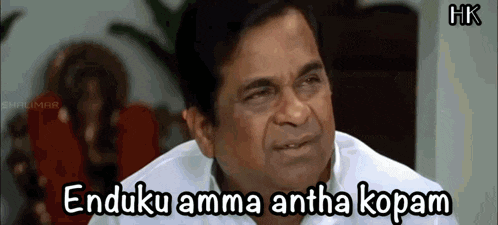 a man in a white shirt is making a funny face and says " enduku amma antha kopam "