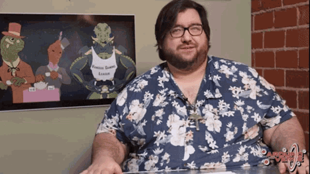 a man wearing a shirt that says female gamer leader