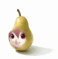 a pear with a girl 's face on it is sitting on a white surface .