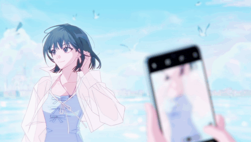 a person is taking a picture of a girl with their phone