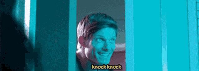 a man standing in a doorway with the words knock knock on the bottom right