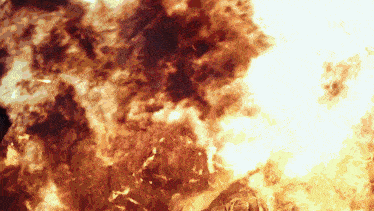a large explosion with a lot of flames and smoke coming out of it