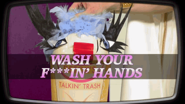a tv screen that says wash your f ** kin ' hands