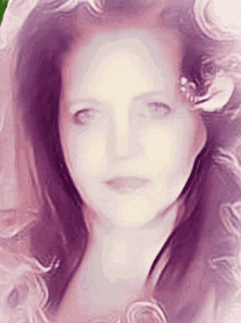 a close up of a woman 's face in a pink frame