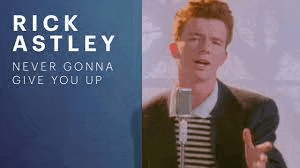 rick astley is singing into a microphone while wearing a suit and striped shirt .