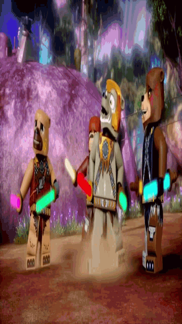 a couple of lego figures standing next to each other with one holding a light saber