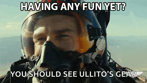 a man wearing a helmet and mask says having any fun yet