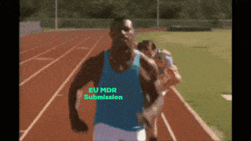 a man in a blue tank top is running on a track with eu mdr submission above him